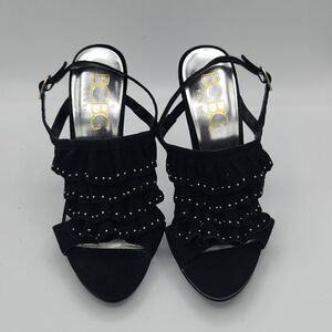 BCBG Paris Black leather upper ruffle metal silver studs Ankle strap stilettos 6